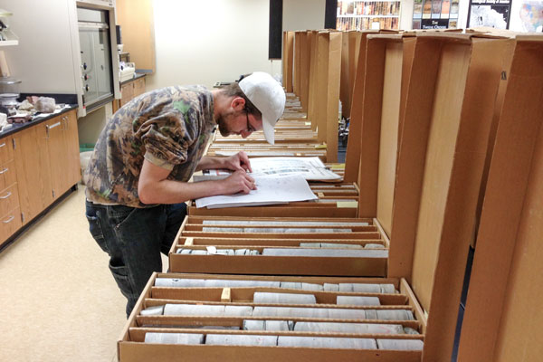 Student working with drill core