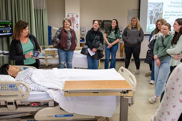 UWGB Nursing students work with a mock patient