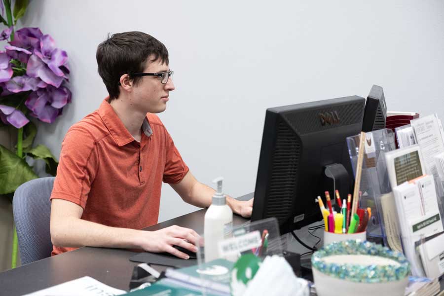 Male student working for UW Green Bay