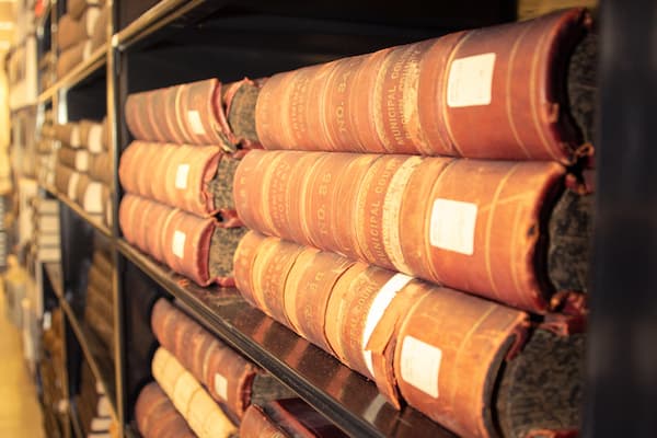 ancient tomes, volumes of archival books in the university archives