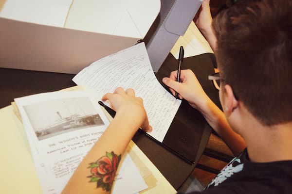 Student takes notes in class