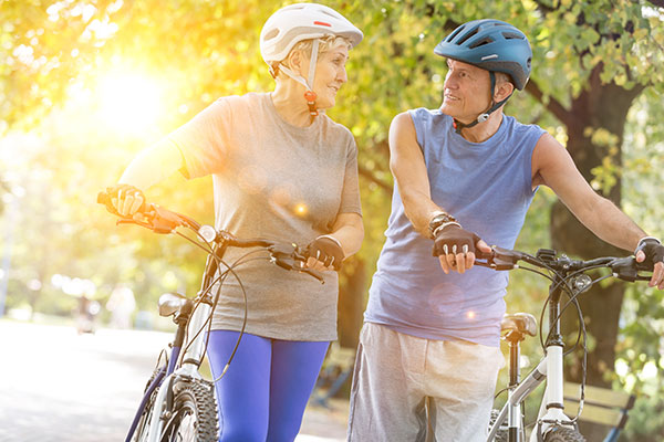 Senior couple with mountain bikes