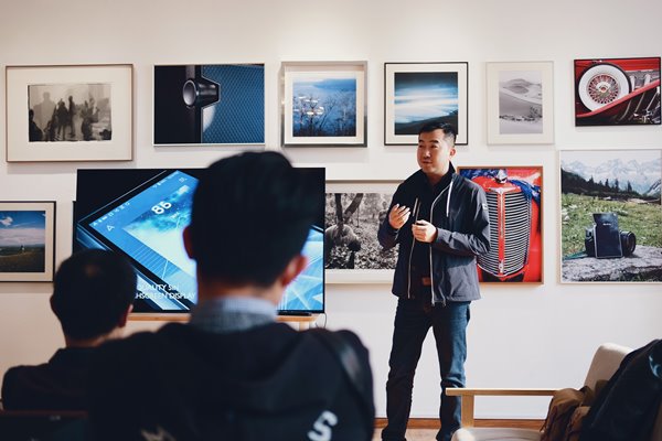 Male gives presentation to group