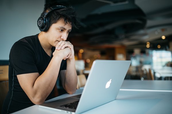 Student with laptop studying