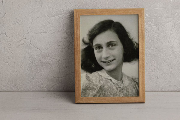 Anne Frank image in a wooden frame