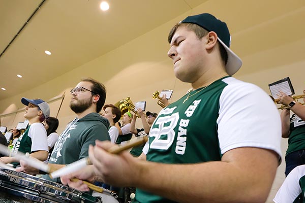 Drumline playing at basketball game