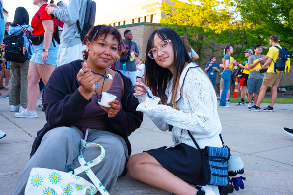 Two international students eating ice cream