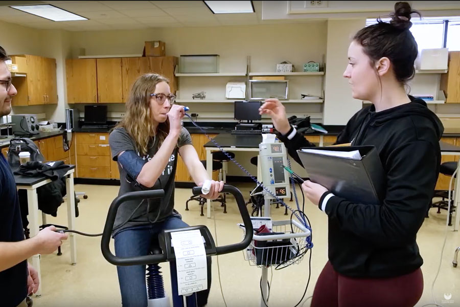 Students in althetic training lab run tests