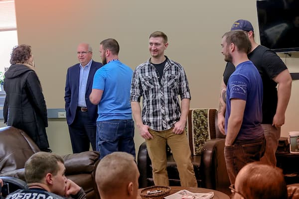 Veterans and guests converse at Veterans Reception