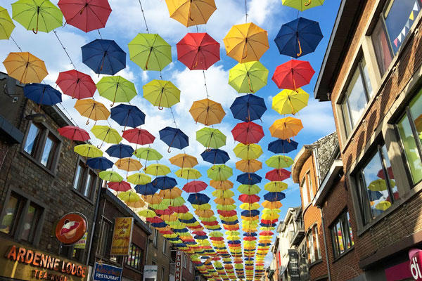 Umbrellas over alleyway