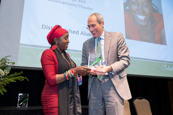 UW-Green Bay Alumni receiving award from Chanecellor Michael Alexander