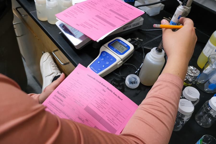 Student in STREAM water research lab