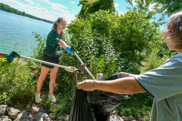 Students participating in water clean up