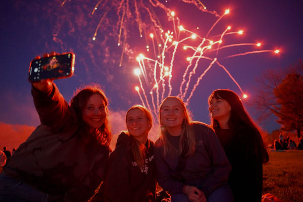 Group of students at end of year fireworks
