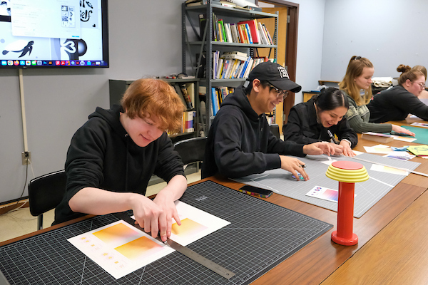 Students working in risograph design studio