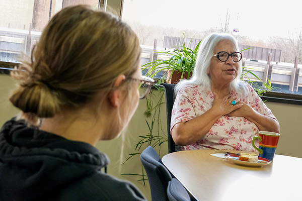 First Nations Elder talking with student