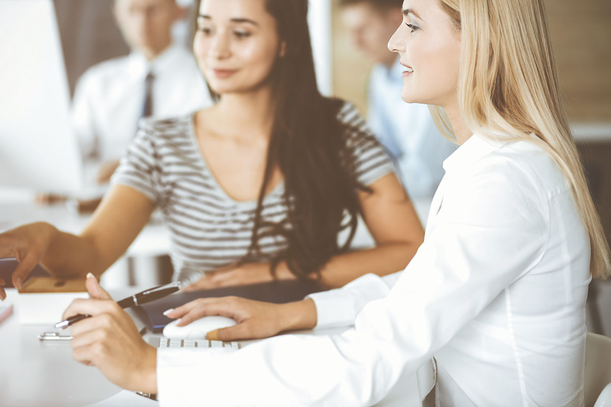 two women in a meeting