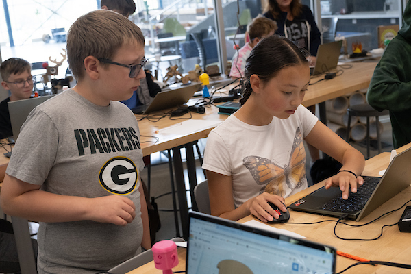 Campers working on laptops