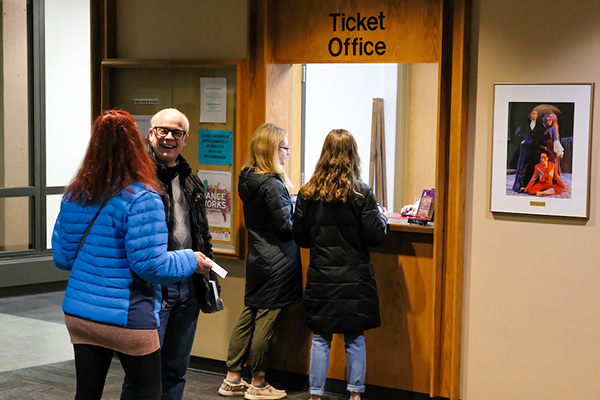 People outside of ticket booth