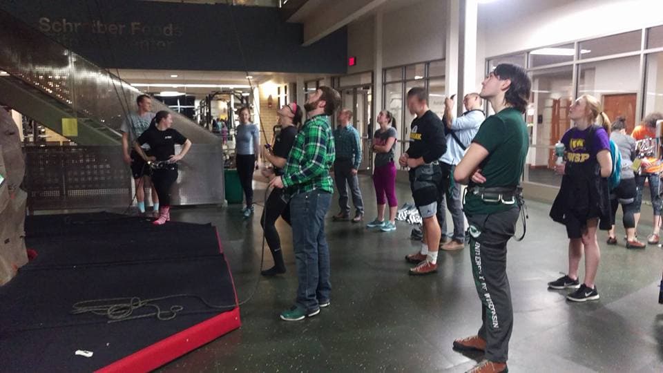 Students using UWGB's 28' tall climbing tower