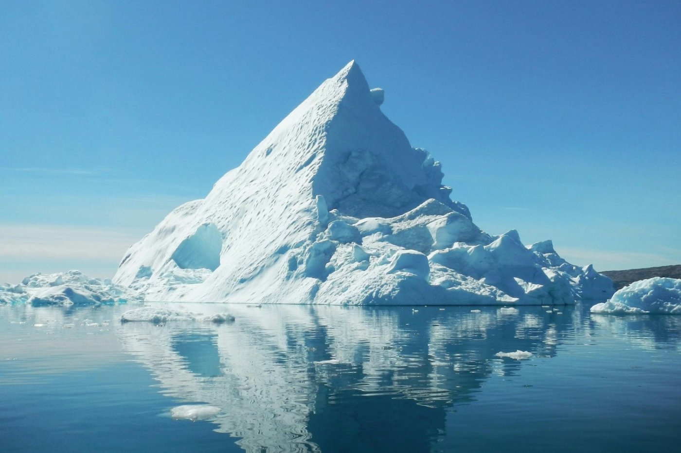 iceberg emerging from the sea