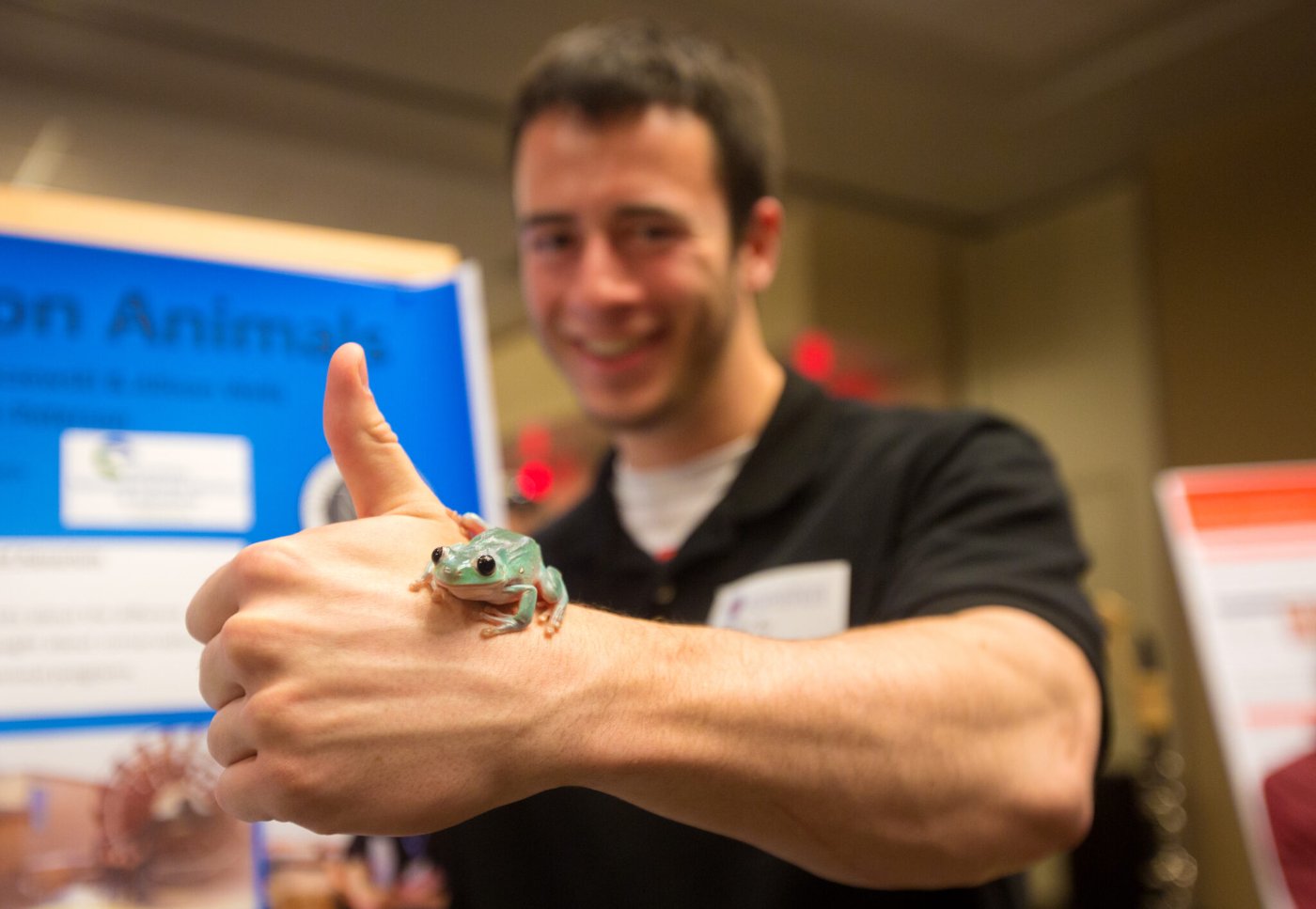 researcher with frog