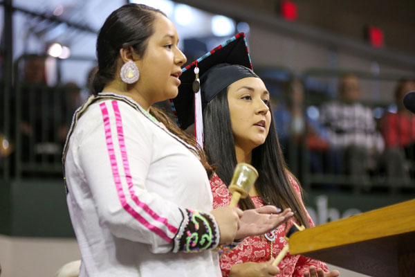 Students speaking at commencement