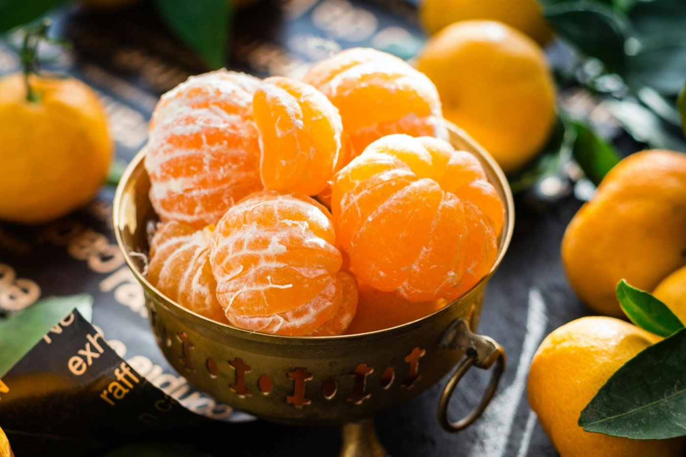 fresh-peeled oranges in a bowl