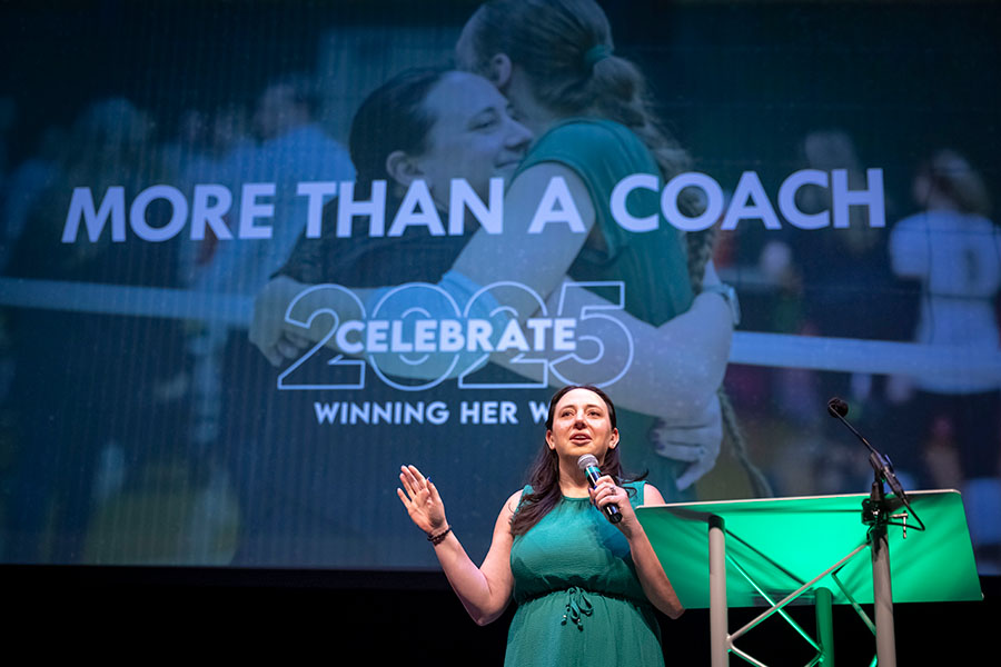 Abbey Sutherland speaking on stage