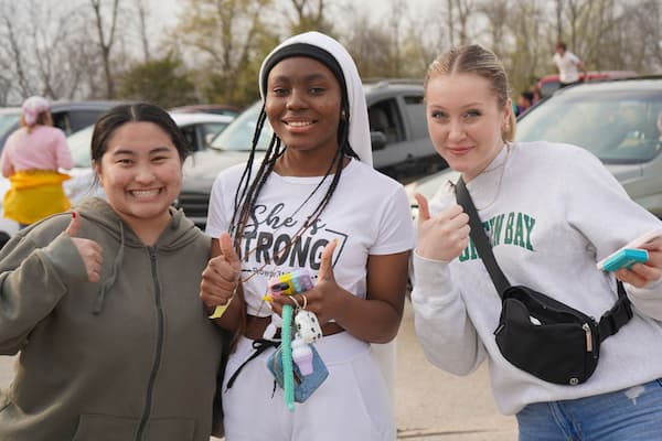 three ethnically diverse female students