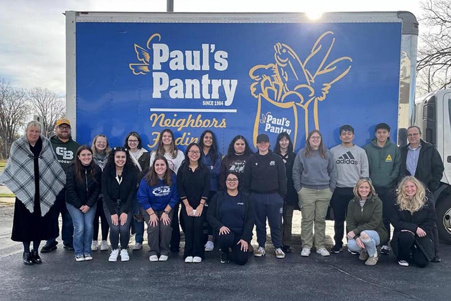 Students in front of Paul's Pantry truck