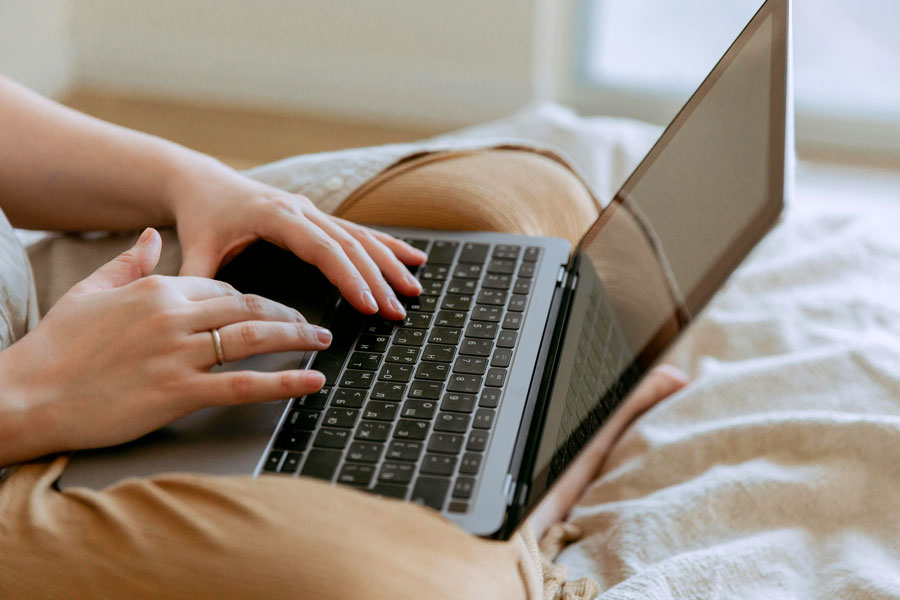 Female typing on laptop