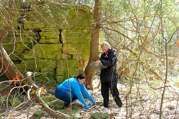 Students collecting data near escarpment