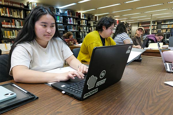 History class working in the UWGB Archives research room