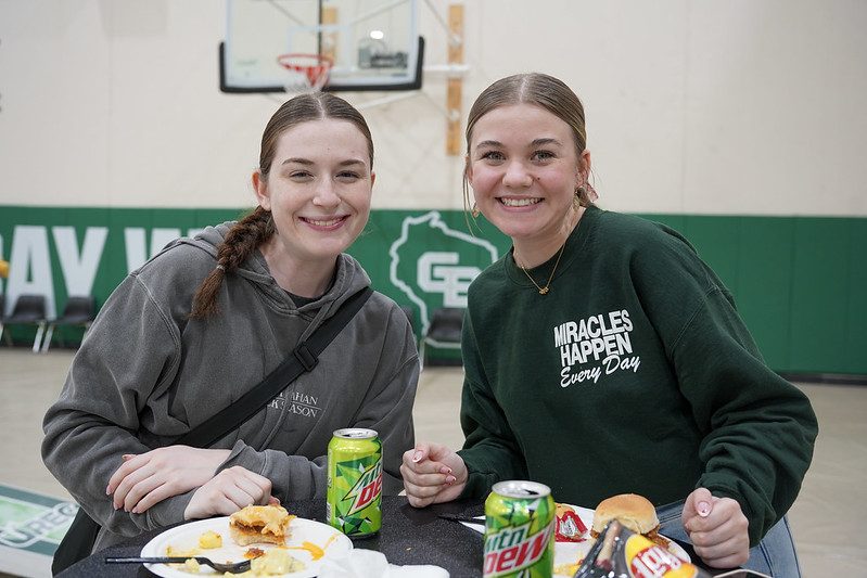 Students enjoy a tailgate meal