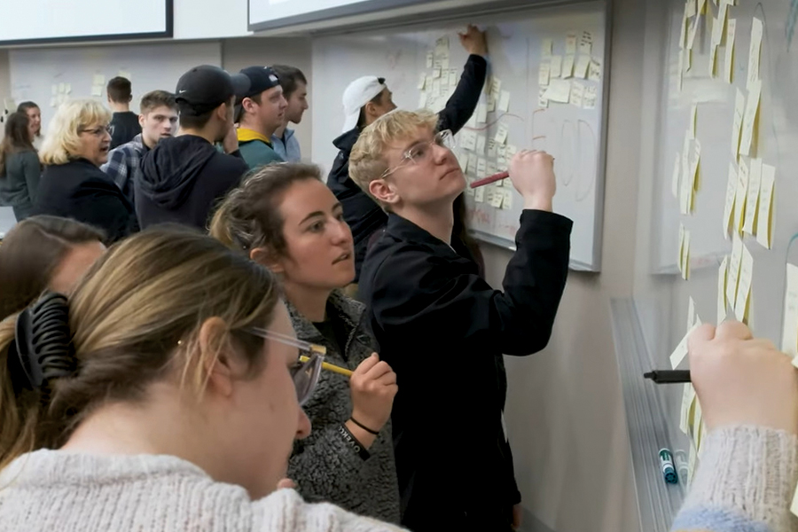 Students brainstorming in a marketing class