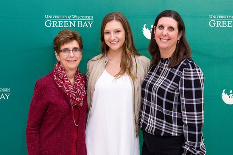 Three generations of UW-Green Bay alumnus pose for photo