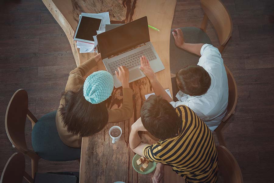 group of students sitting at a table