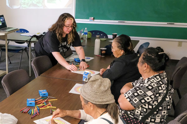 Dietetic student holding a class for Native Americans during summer practicum