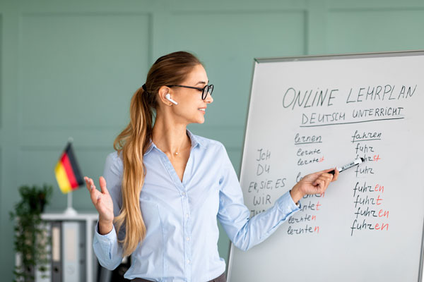 Teacher teaching german to online students