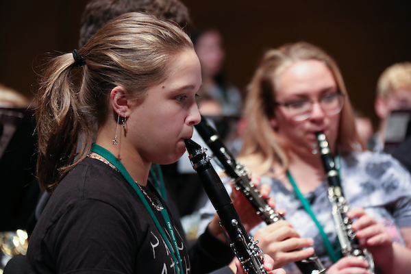 Campers playing the clarinet