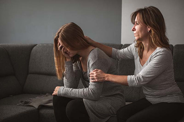 social worker comforting person