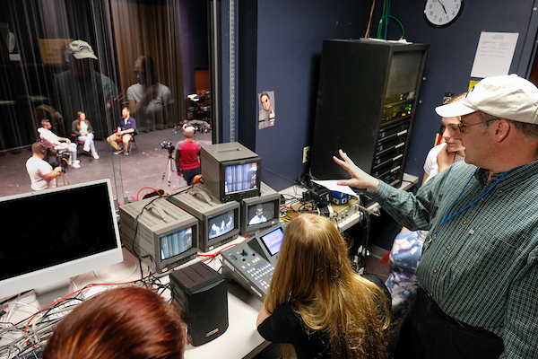 Students in film studies production room