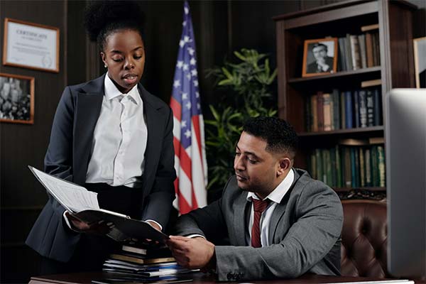 Law officers looking over a document