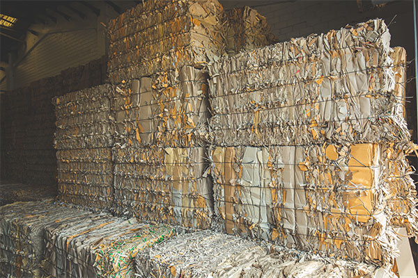 Waste paper and cardboard bales for recycling