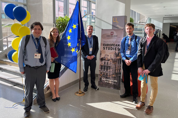 Institute for European Studies students pose by European flag