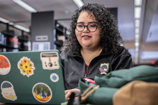 Fabiola Resendiz working on laptop