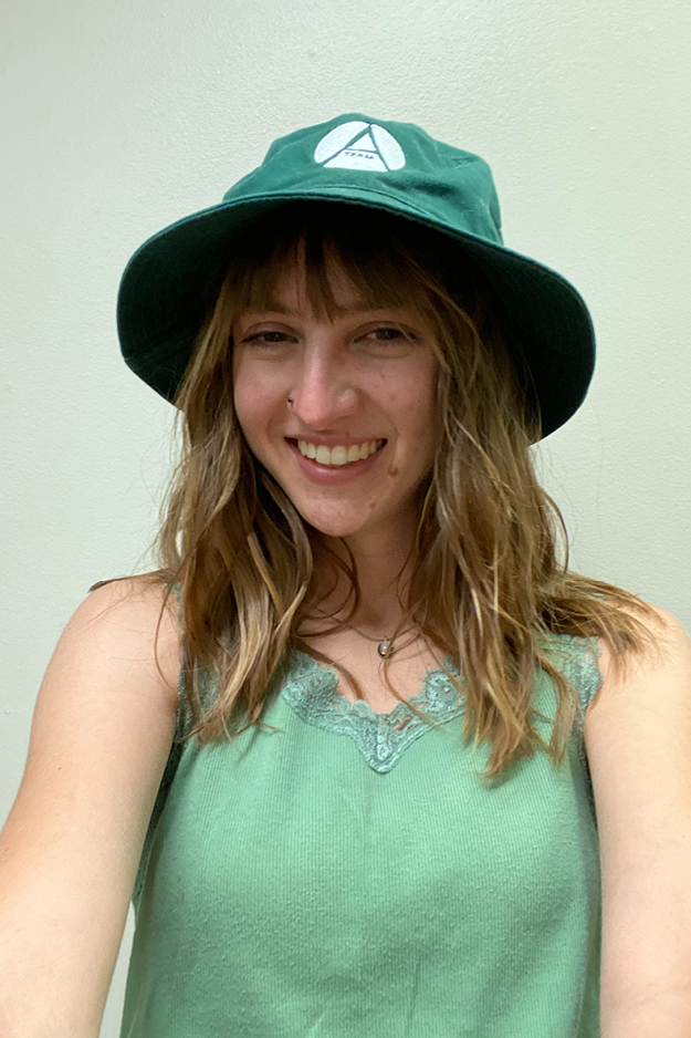 A female student wearing a hat