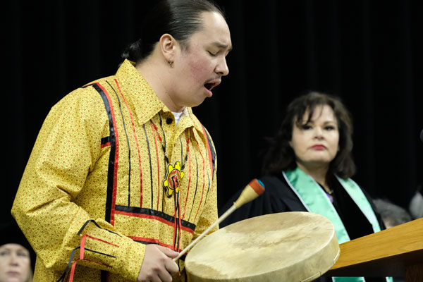 Indigenous drummer at Commencement