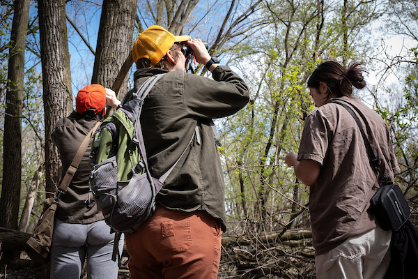 Students outdoors bird watching